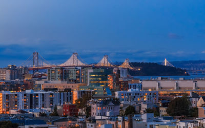 Buildings in city against sky