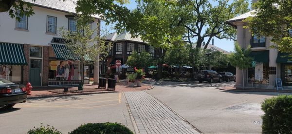 Street by buildings in city