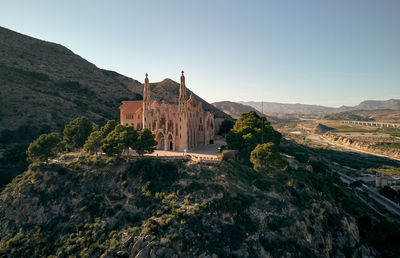 High angle view of historic building against sky