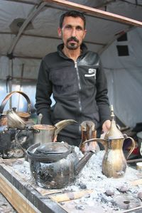 Mid adult man working in tray