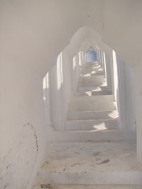 Staircase in white building