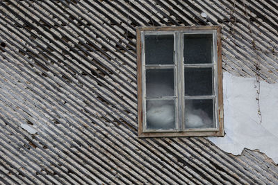 Window of an old house in spania dolina village, northern slovakia.