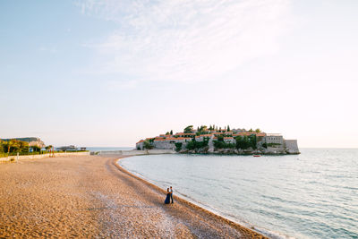 Scenic view of beach against sky