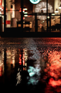 Reflection of illuminated building in water