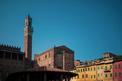 Tower of mangia, pubblico palace, piazza del campo, siena, italy
