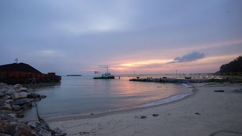 Scenic view of sea at sunset