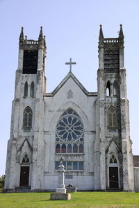 Low angle view of building against sky, old cathedral.