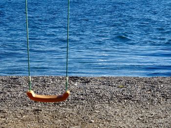 Close-up of boat moored in sea