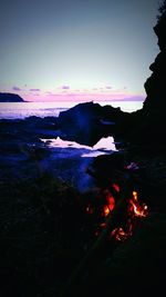 Scenic view of sea at sunset