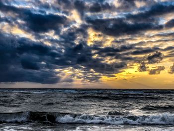 Scenic view of sea against sky during sunset