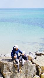 Full length of man on beach against sky