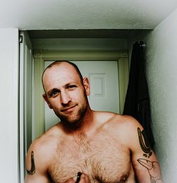 Portrait of shirtless man