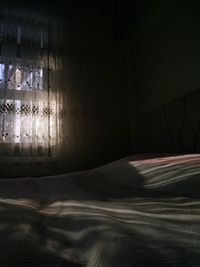 Sunlight falling on bed at home