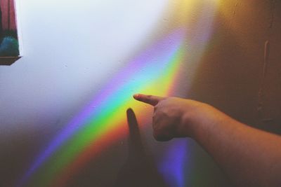 Close-up of rainbow over blurred background