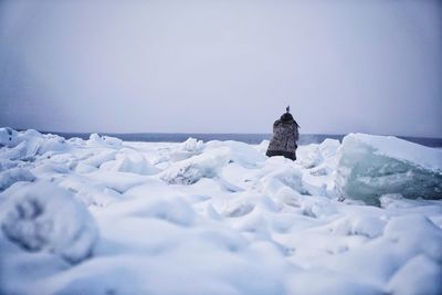 Scenic view of sea against clear sky during winter