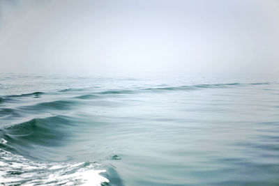 Scenic view of seascape against blue sky