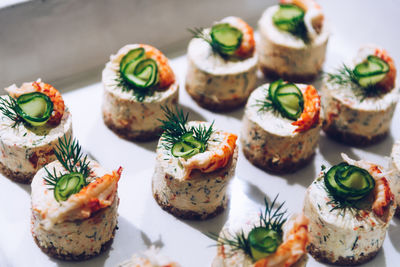 High angle view of sushi served on table