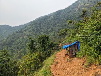 Temporary sheds built by tribal villagers for children to attend online classes on mobile network.