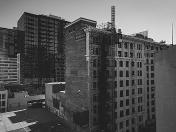 Buildings against clear sky in city