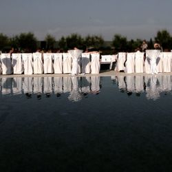 Deck chairs against sky