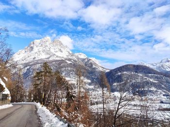 Scenic view of snowcapped mountains against sky