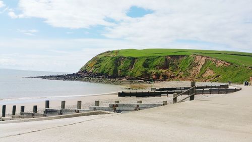 Scenic view of beach against sky