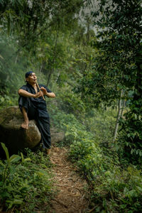 Man with a bamboo flute..