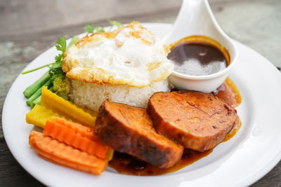 Close-up of breakfast served on table