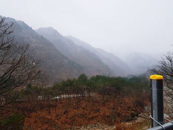 Scenic view of mountains against sky during winter