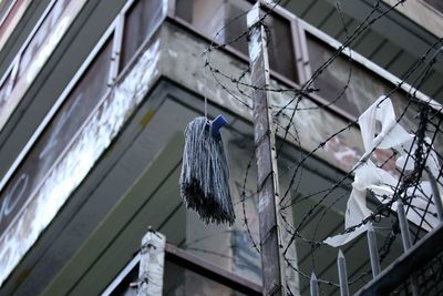 Low angle view of clothes hanging against sky