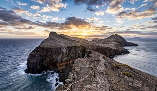 Rock formations in sea against sky during sunset madeira portugal 