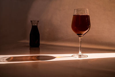 Close-up of wine in glass on table