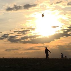 Scenic view of landscape at sunset