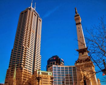 Low angle view of building against blue sky