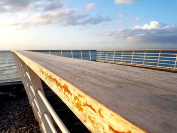 Pier over sea against sky