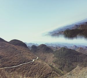 Scenic view of rocky mountains against sky