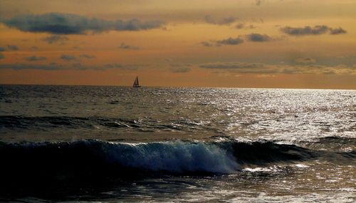 Scenic view of sea against sky during sunset