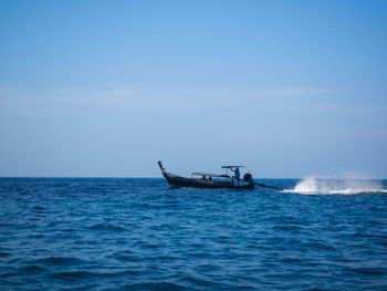 Boat sailing in sea