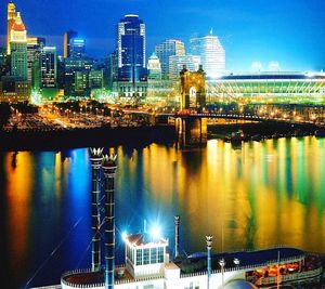 City lit up at waterfront