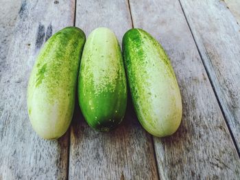 Close-up of green fruits on table