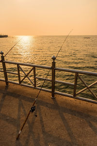 Scenic view of sea against clear sky during sunset