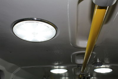 Low angle view of illuminated electric lamp