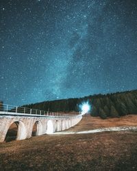 Scenic view of star field against sky at night