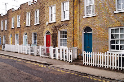 View of building with colorful doors 