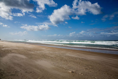 Scenic view of beach against sky