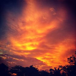 Low angle view of dramatic sky during sunset