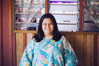 Portrait of smiling young woman