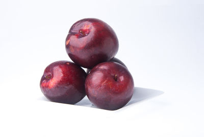 Close-up of apple against white background