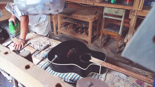 High angle view of man working on table