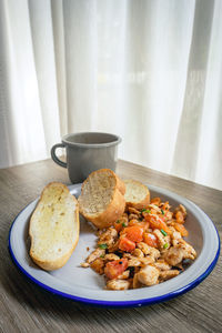 Close-up of breakfast served on table